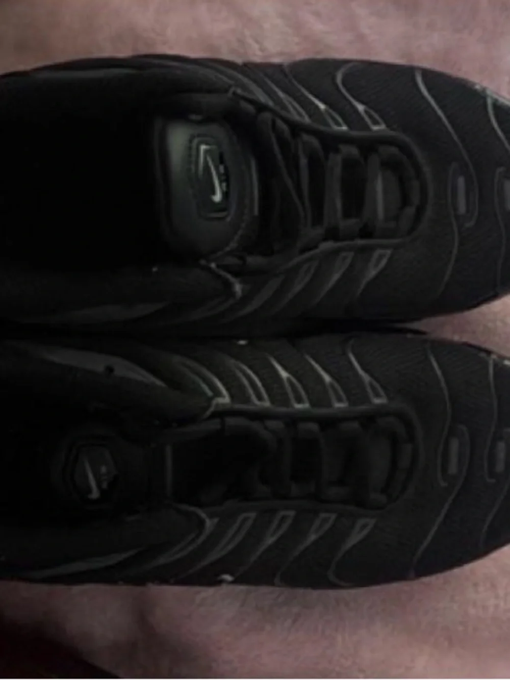 Nike Women's Black Athletic Sneakers with Subtle Silver Accents